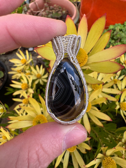 Banded Black Agate Wrapped in Sterling Silver